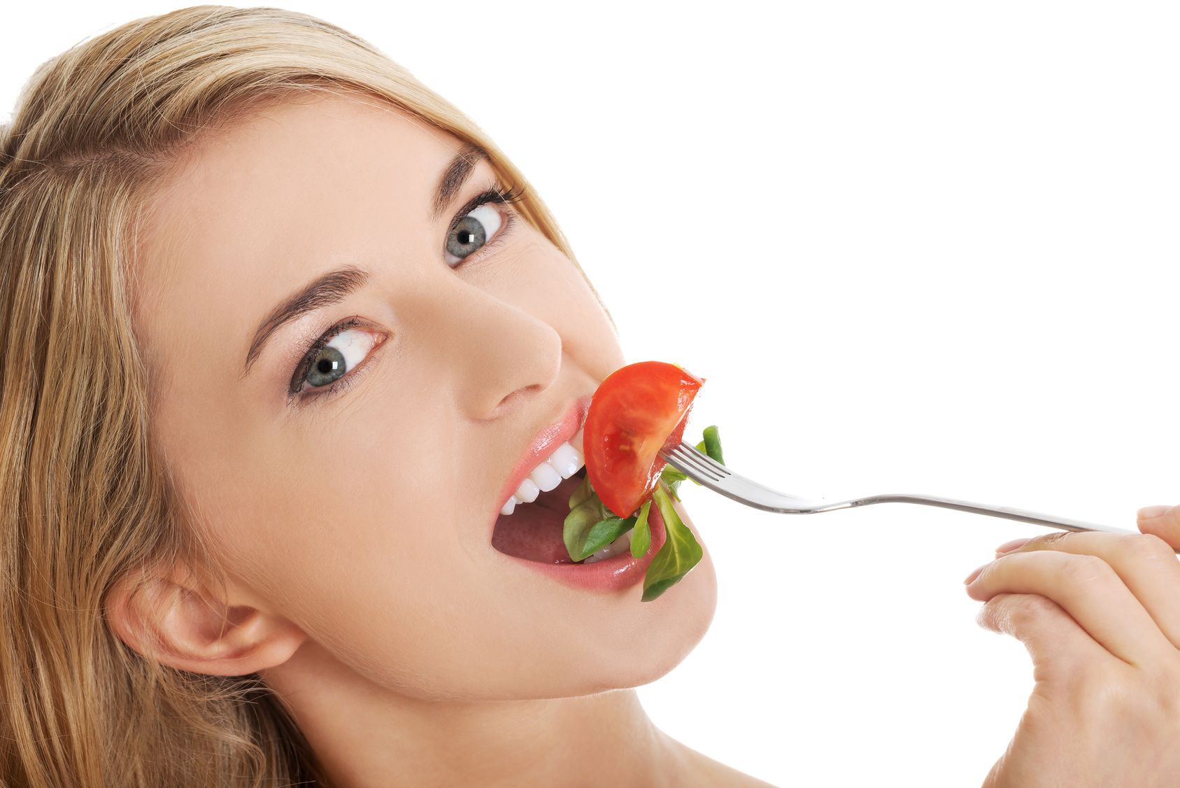 Smiling woman eating salat